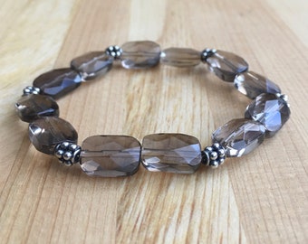 9x12mm Faceted Smokey Quartz stretch bracelet with Sterling Silver Bali Beads
