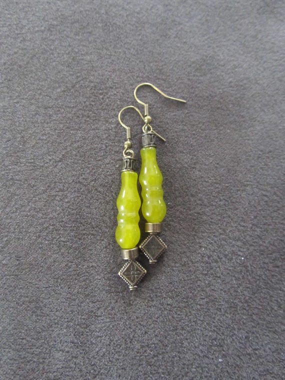 Carved jadeite gemstone and bronze earrings