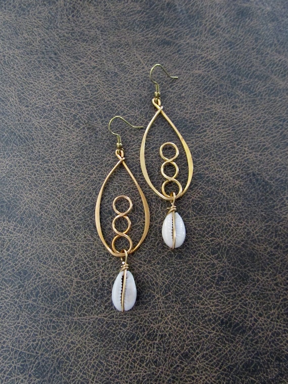 Hammered brass and cowrie shell hoop earrings