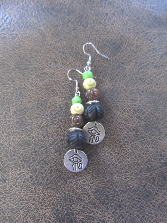 Silver evil eye and carved bone earrings