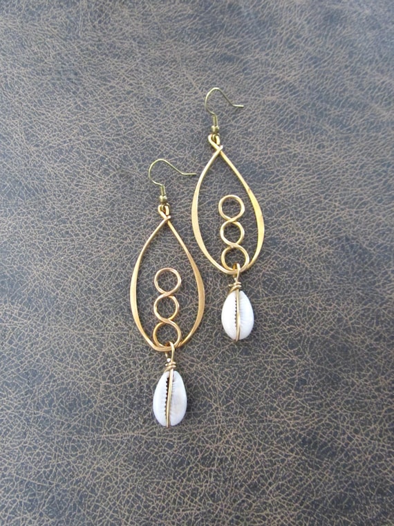 Hammered brass and cowrie shell hoop earrings