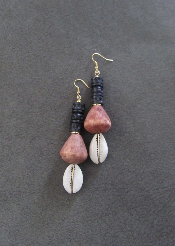 Long carved wooden and cowrie shell earrings