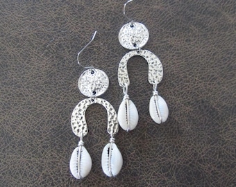 Unique hammered silver cowrie shell earrings