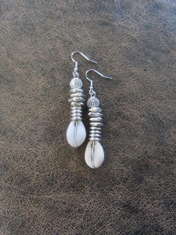 Modern silver cowrie shell earrings