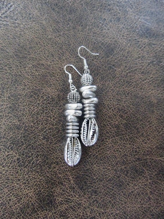 Modern silver cowrie shell earrings
