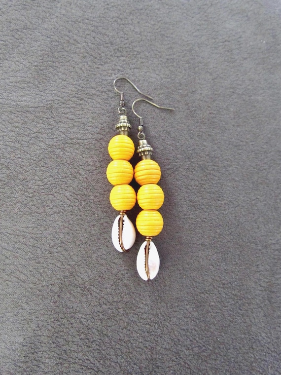 Wooden and cowrie shell earrings, yellow