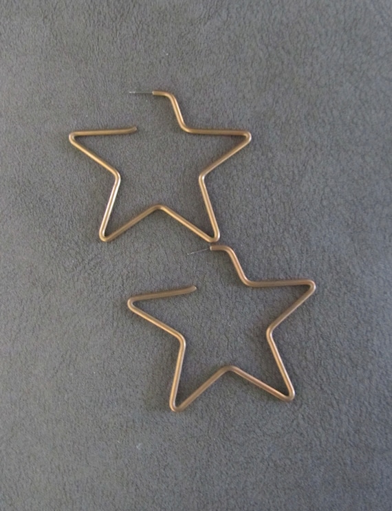 Huge oversized brass star earrings