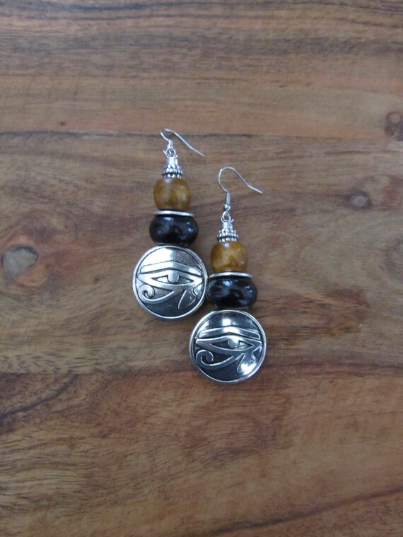 Silver eye of Ra and wooden earrings