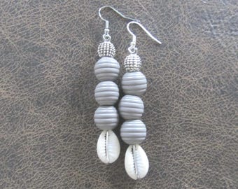 Wooden and cowrie shell earrings, gray