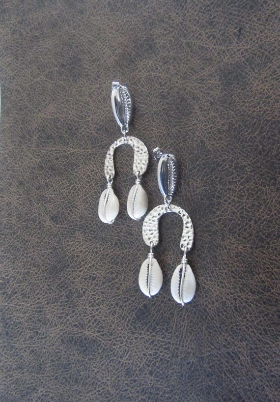 Unique silver cowrie shell earrings