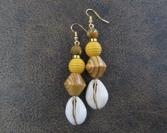 Chunky wood and cowrie shell earrings, yellow