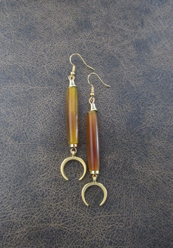 Long orange horn earrings