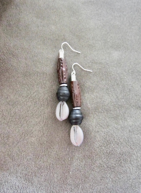 Carved wooden and cowrie shell earrings