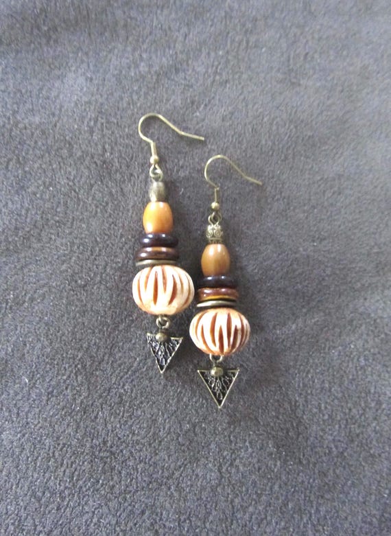 Carved bone and bronze ethnic earrings