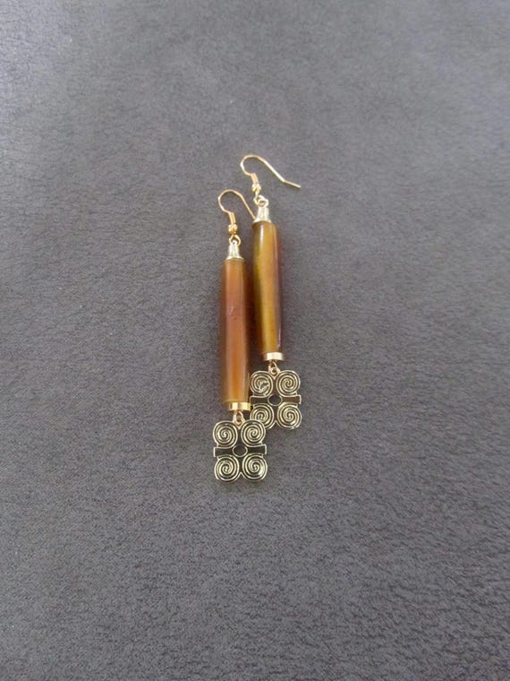 Gold adinkra symbol Afrocentric African earrings, orange bone primitive exotic earrings, strength dwennimmen