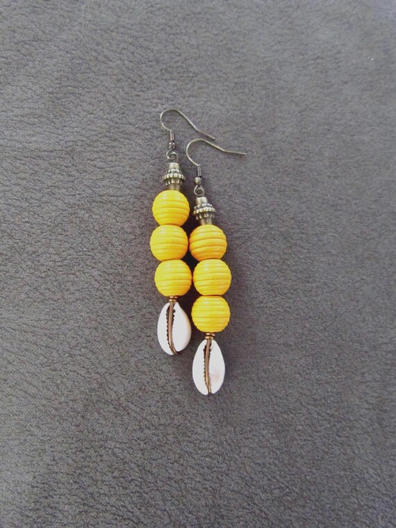 Wooden and cowrie shell earrings, yellow