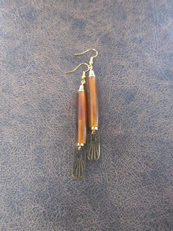 Long orange hairpipe mid century sunburst earrings