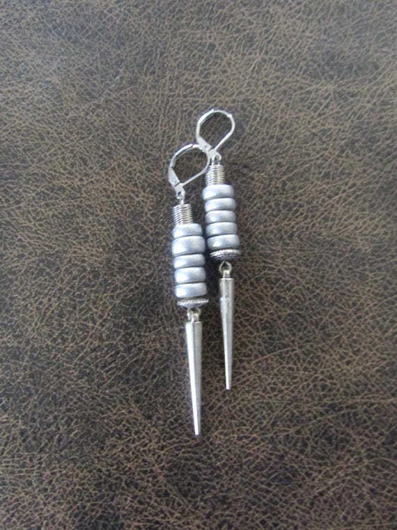 Minimalist monochromatic silver spike earrings