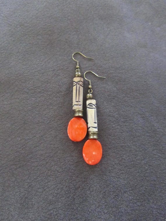 African mask carved bone primitive earrings, orange