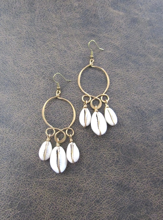 Bold brass and cowrie shell hoop earrings