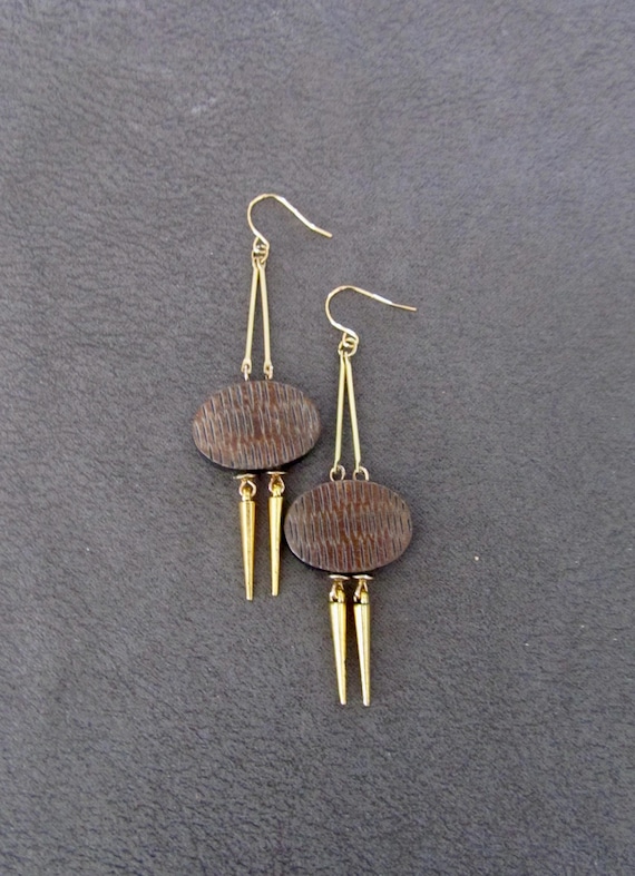 Carved bone and gold earrings