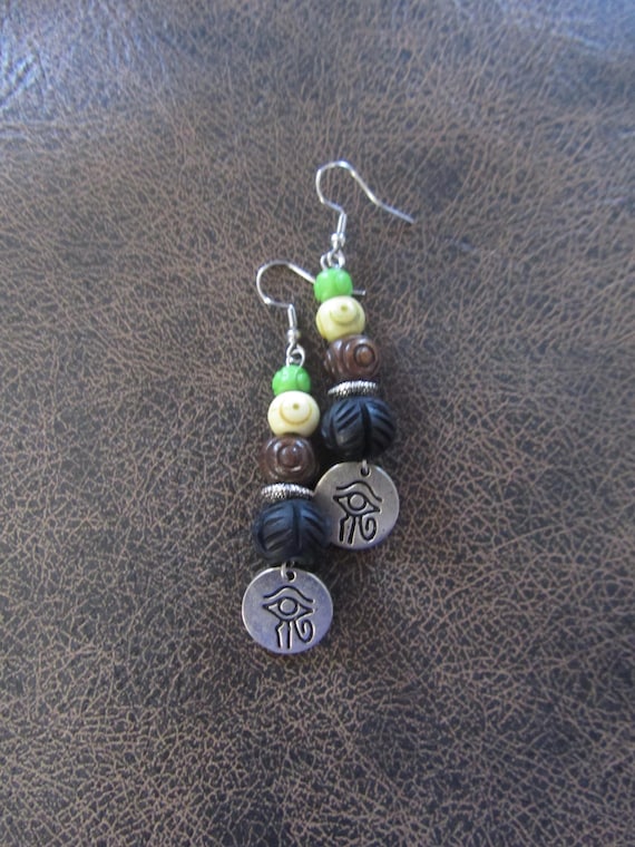 Silver evil eye and carved bone earrings