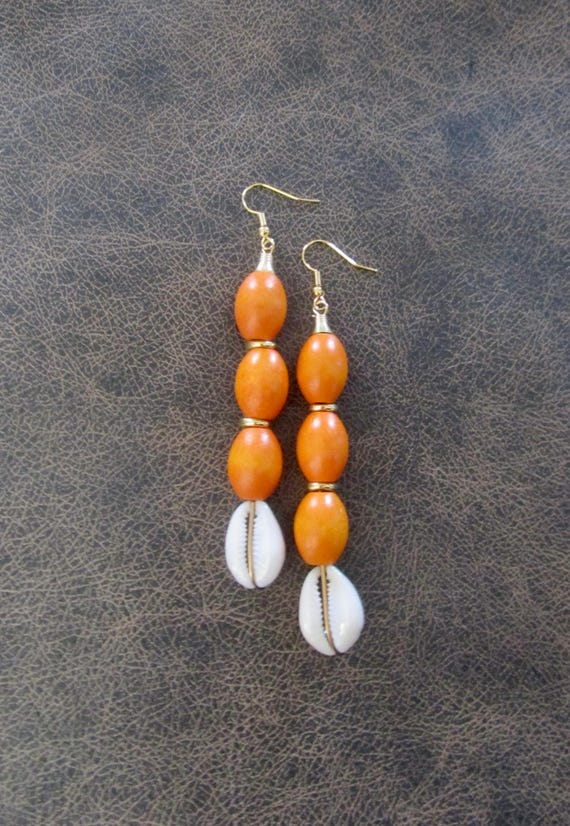 Orange wooden and cowrie shell earrings 22