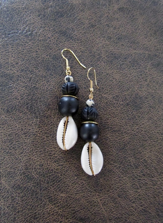 Cowrie shell earrings and chunky black wooden earrings