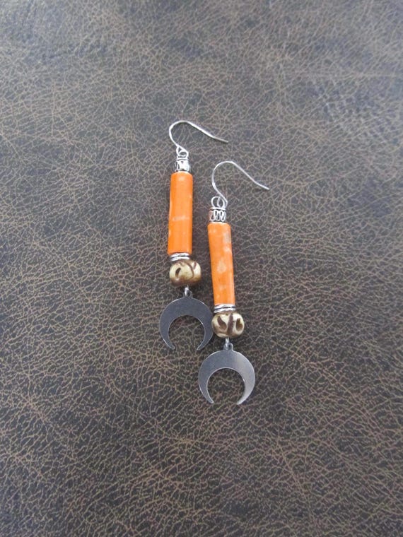 Carved bone and silver earrings, orange