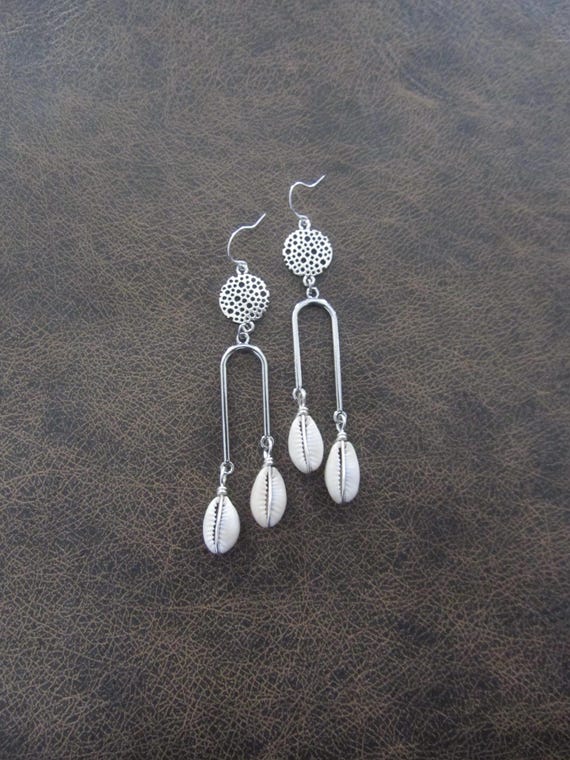 Unique silver cowrie shell earrings 200