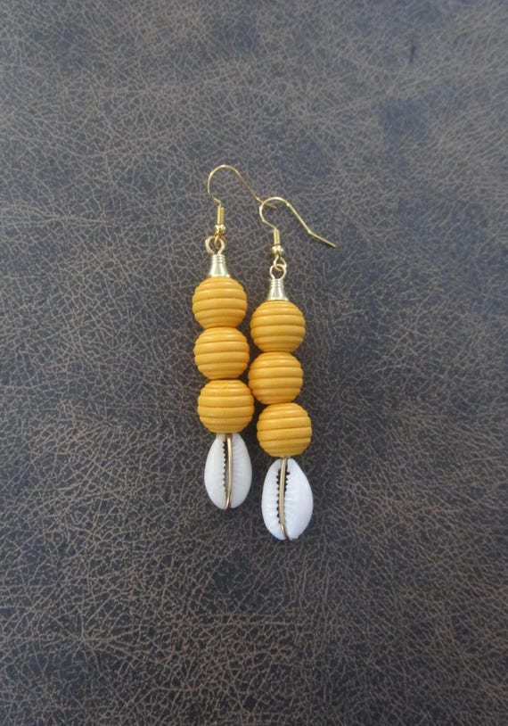 Wooden and cowrie shell earrings, yellow 2