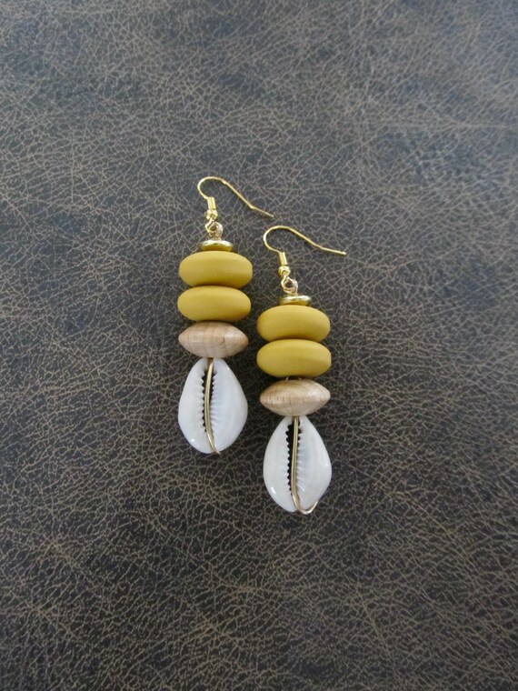 Cowrie shell and yellow mid century earrings
