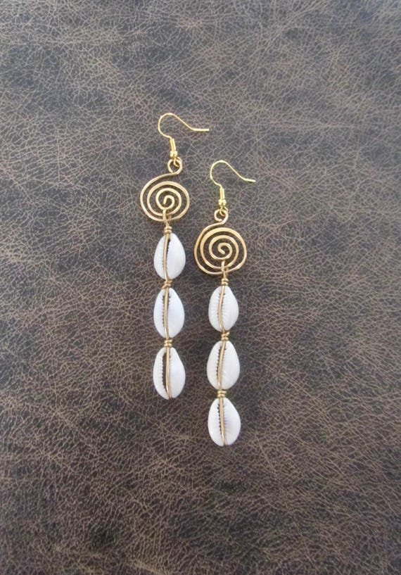 Long cowrie shell earrings, gold