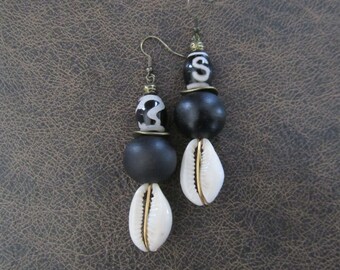 Cowrie shell earrings and chunky black wooden earrings