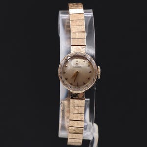 Relógio mecânico vintage OMEGA da década de 1950, caixa e pulseira em ouro amarelo maciço 14K