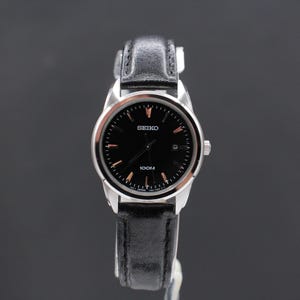 Vintage Ladies Seiko 7N82-OHFO  WR100 Black Dial Date Quartz Watch New Battery