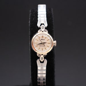 vintage montre-bracelet mécanique automatique MIdo Poverwind pour femme en or blanc, révisée