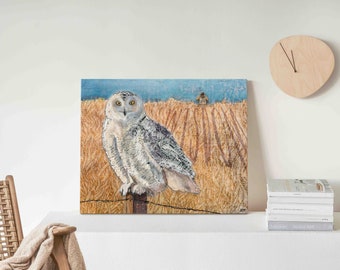 20"x16"x 1.5" Wrapped Canvas Printof a mixed media collage of a Snowy Owl perched on a fence post with birdwatcher in background