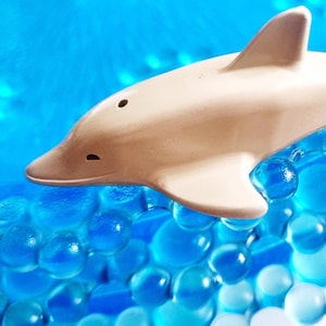 Pièce vintage représentant un dauphin Lego blanc | Modèle abandonné extrêmement rare | Art déco marin | Figurine de dauphin