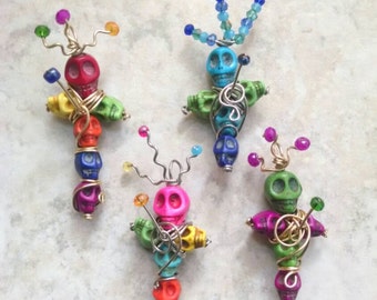 Voodoo doll pendants, Themed colors