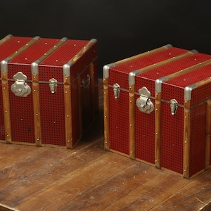Pair of red hat trunks