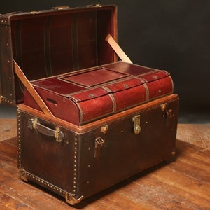 Curved leather trunk