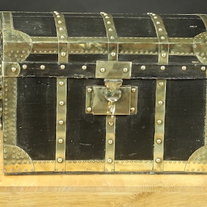 Doll trunk, coated canvas and brass