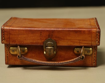 Mini leather suitcase