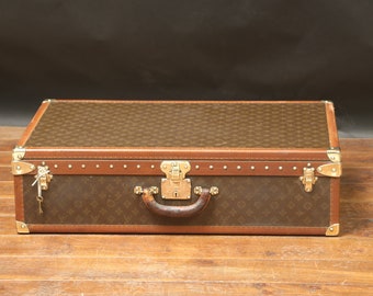 Louis Vuitton suitcase Alzer 80 monogrammed with its key