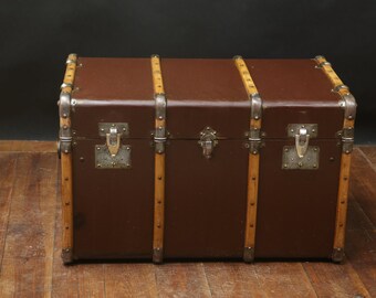 Brown curved steamer trunk