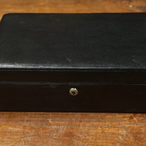 Black leather box, padded interior