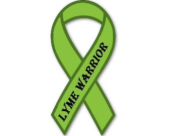 May include: Green ribbon with the text "LYME WARRIOR" in black lettering.