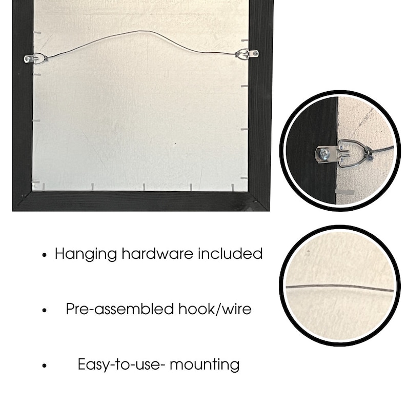 May include: Back of a framed artwork with a black wooden frame. The back features a silver canvas and a pre-assembled wire for hanging. Hanging hardware is included, and the mounting is easy to use.