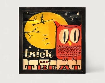 May include: A square framed wall art piece featuring a large yellow moon against a dark sky with a silhouette of a witch on a broomstick. An orange owl with large eyes sits in the foreground above the text "trick or TREAT" in black lettering.